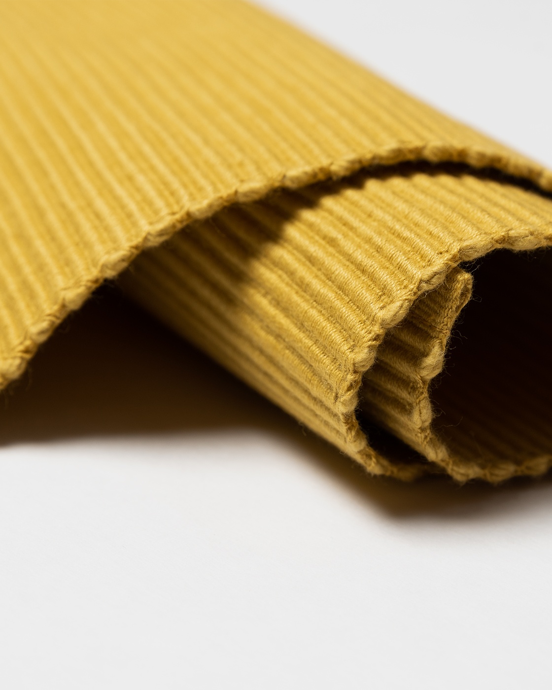 Product image mustard yellow UNI runner of soft cotton in ribbed quality from LINUM DESIGN. Size 45x150 cm.