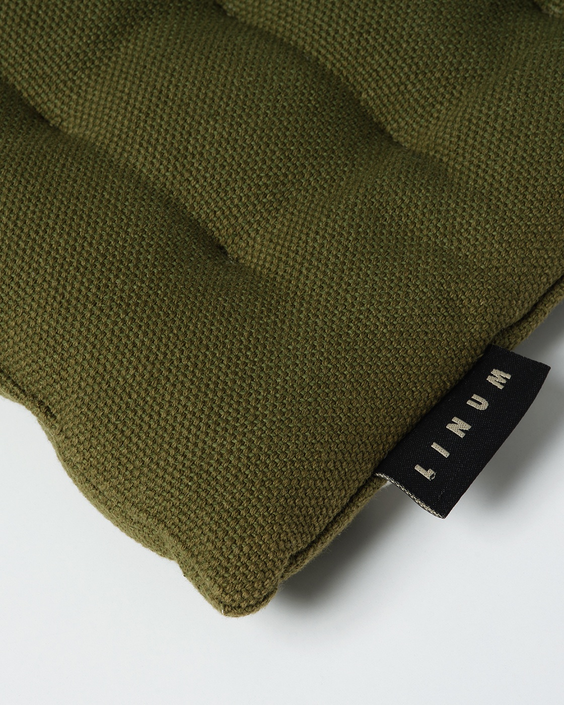Product image dark olive green PEPPER seat cushion made of soft cotton with recycled polyester filling from LINUM DESIGN. Size 40x40 cm.