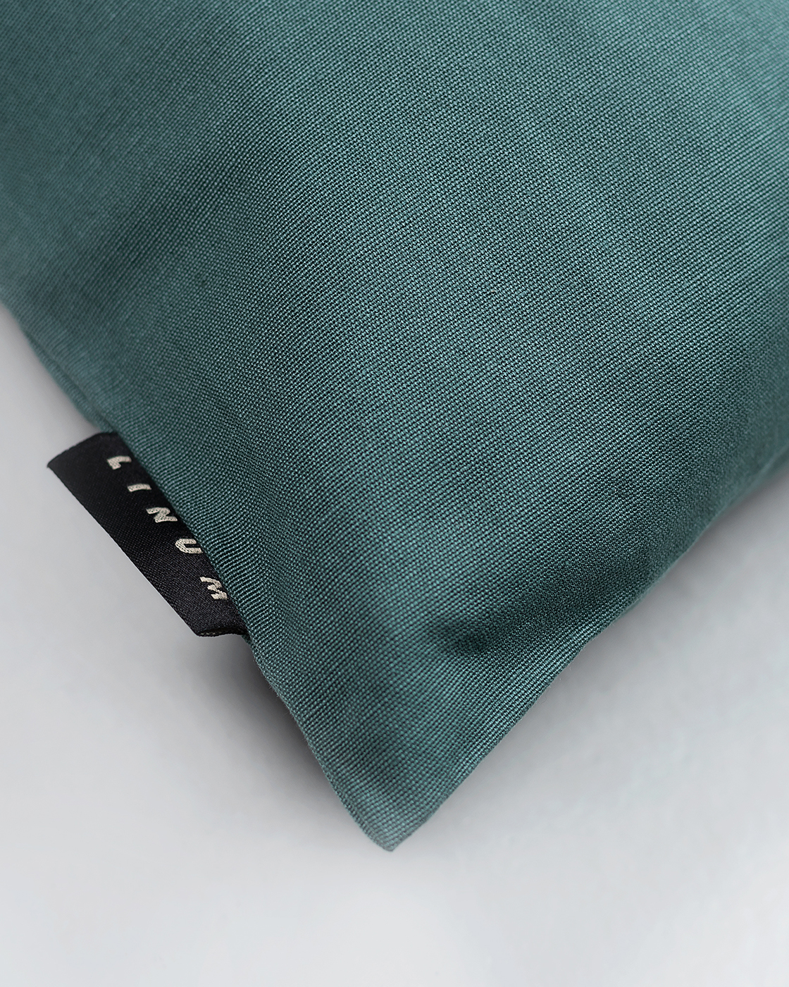 Product image dark grey turquoise ANNABELL cushion cover made of soft cotton from LINUM DESIGN. Size 40x40 cm.