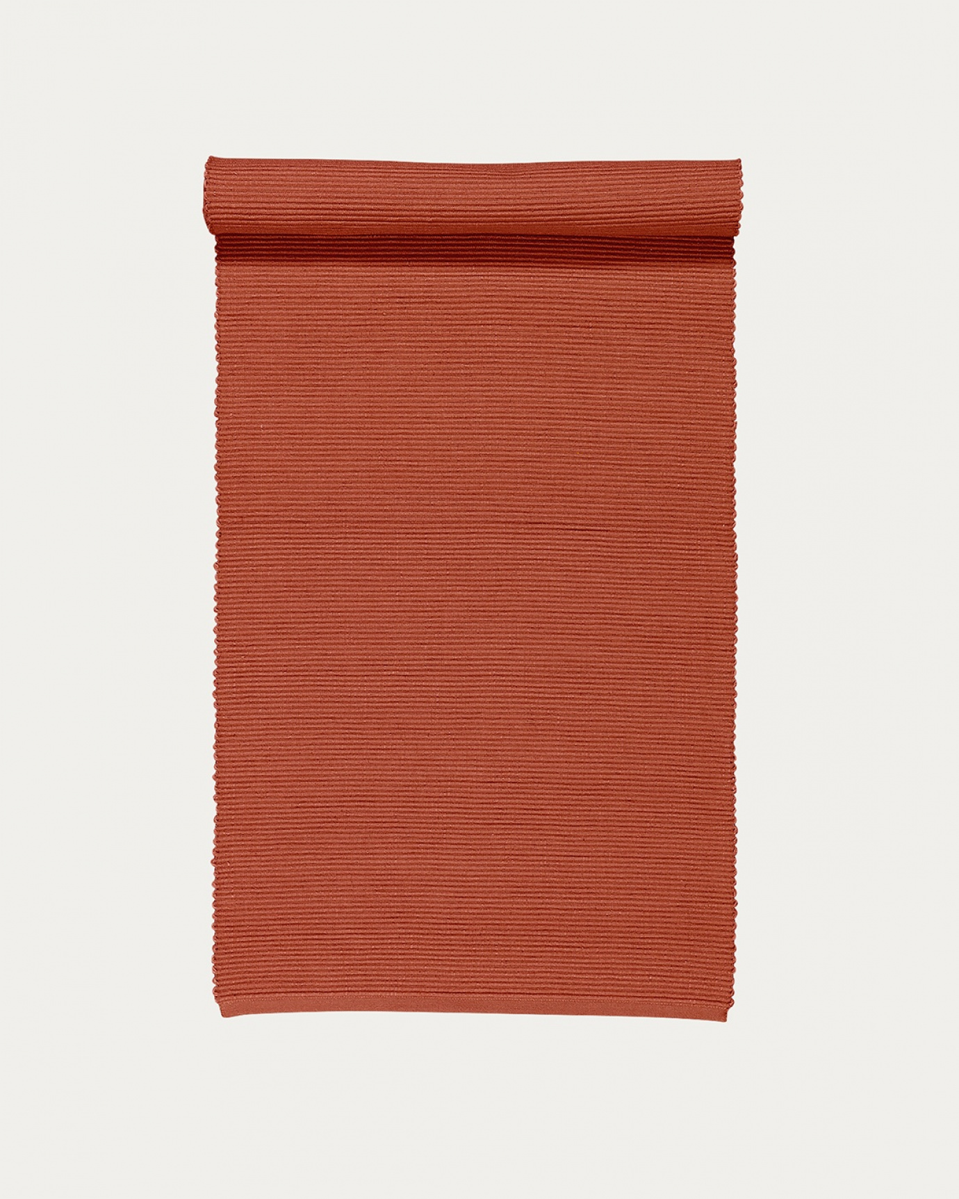 Produktbild rostorange UNI Tischläufer aus weicher Baumwolle in Rippenqualität von LINUM DESIGN. Größe 45x150 cm.
