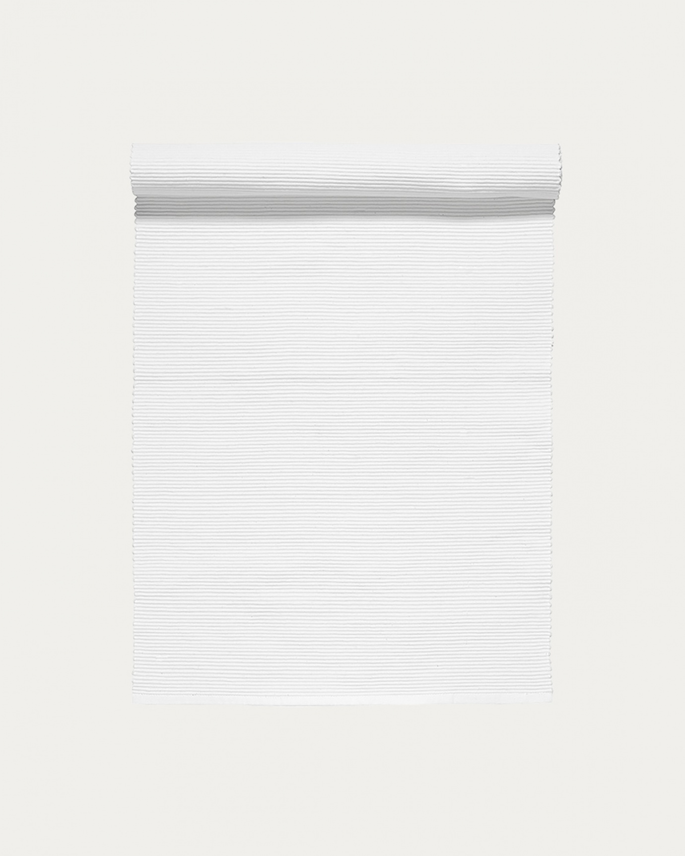 Image du produit chemin de table UNI blanc en coton doux de qualité côtelée de LINUM DESIGN. Taille 45 x 150 cm.
