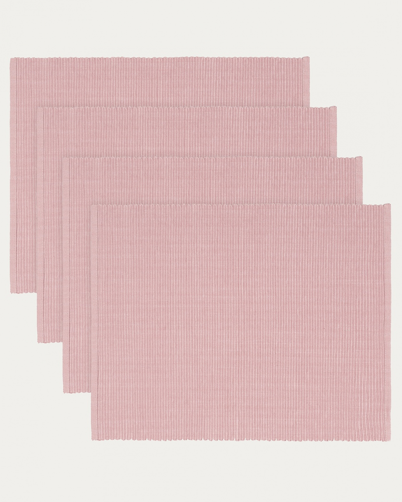 Produktbild dammig rosa UNI bordstablett av mjuk bomull i ribbad kvalité från LINUM DESIGN. Storlek 35x46 cm och säljs i 4-pack.