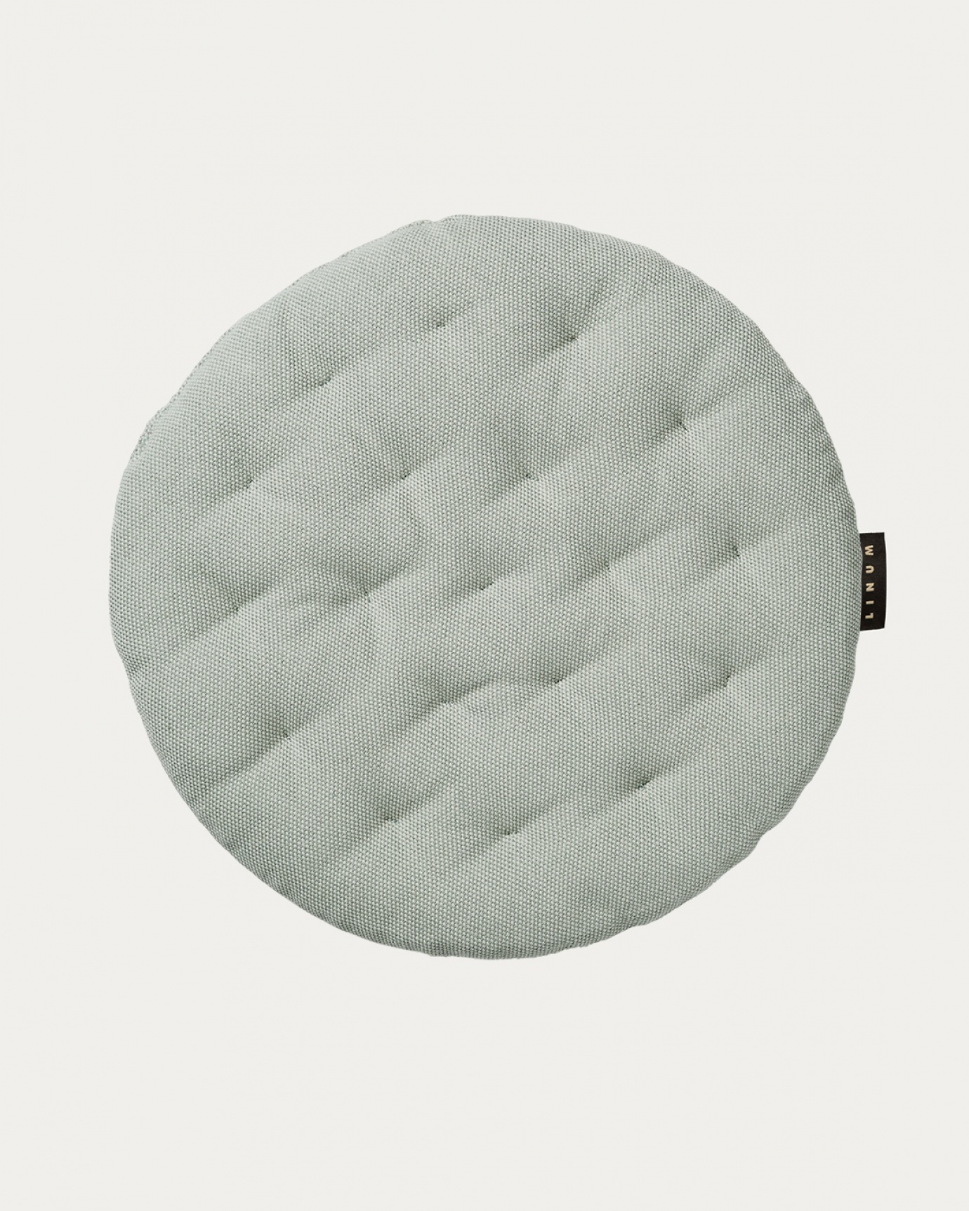 Produktbild ljus isgrön PEPPER sittdyna av mjuk bomull med återvunnen polyesterfyllning från LINUM DESIGN. Storlek ø37 cm.