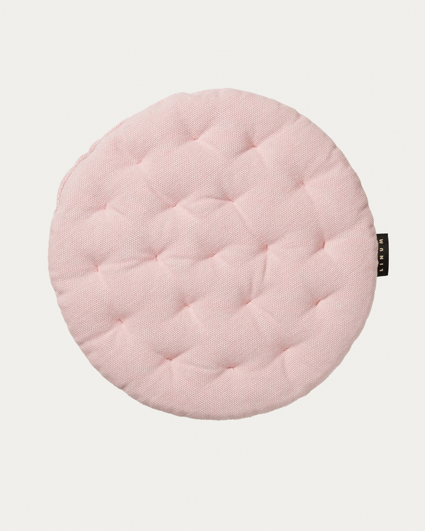 Produktbild dammig rosa PEPPER sittdyna av mjuk bomull med återvunnen polyesterfyllning från LINUM DESIGN. Storlek ø37 cm.