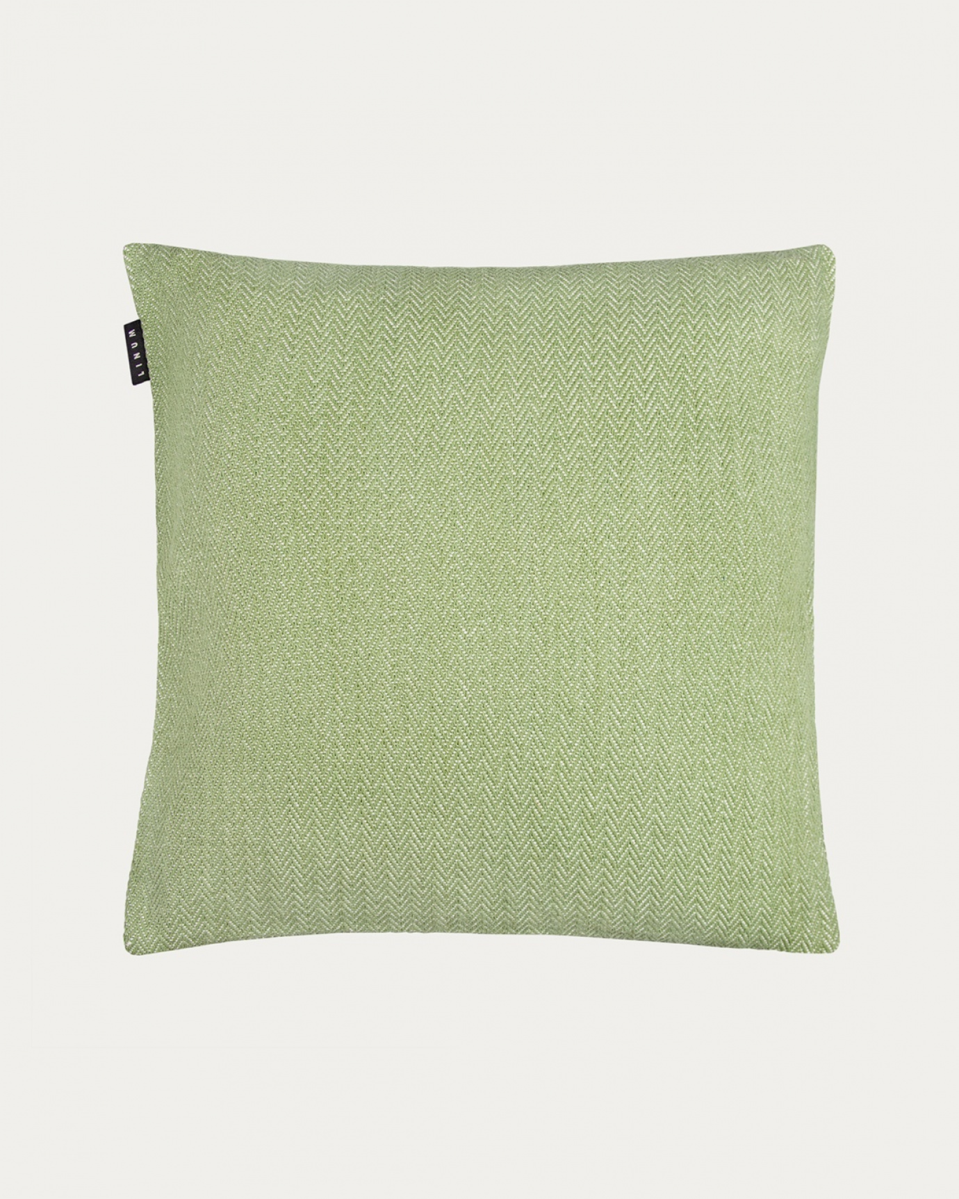 Product image moss green SHEPARD cushion cover made of soft cotton with a discreet herringbone pattern from LINUM DESIGN. Size 50x50 cm.