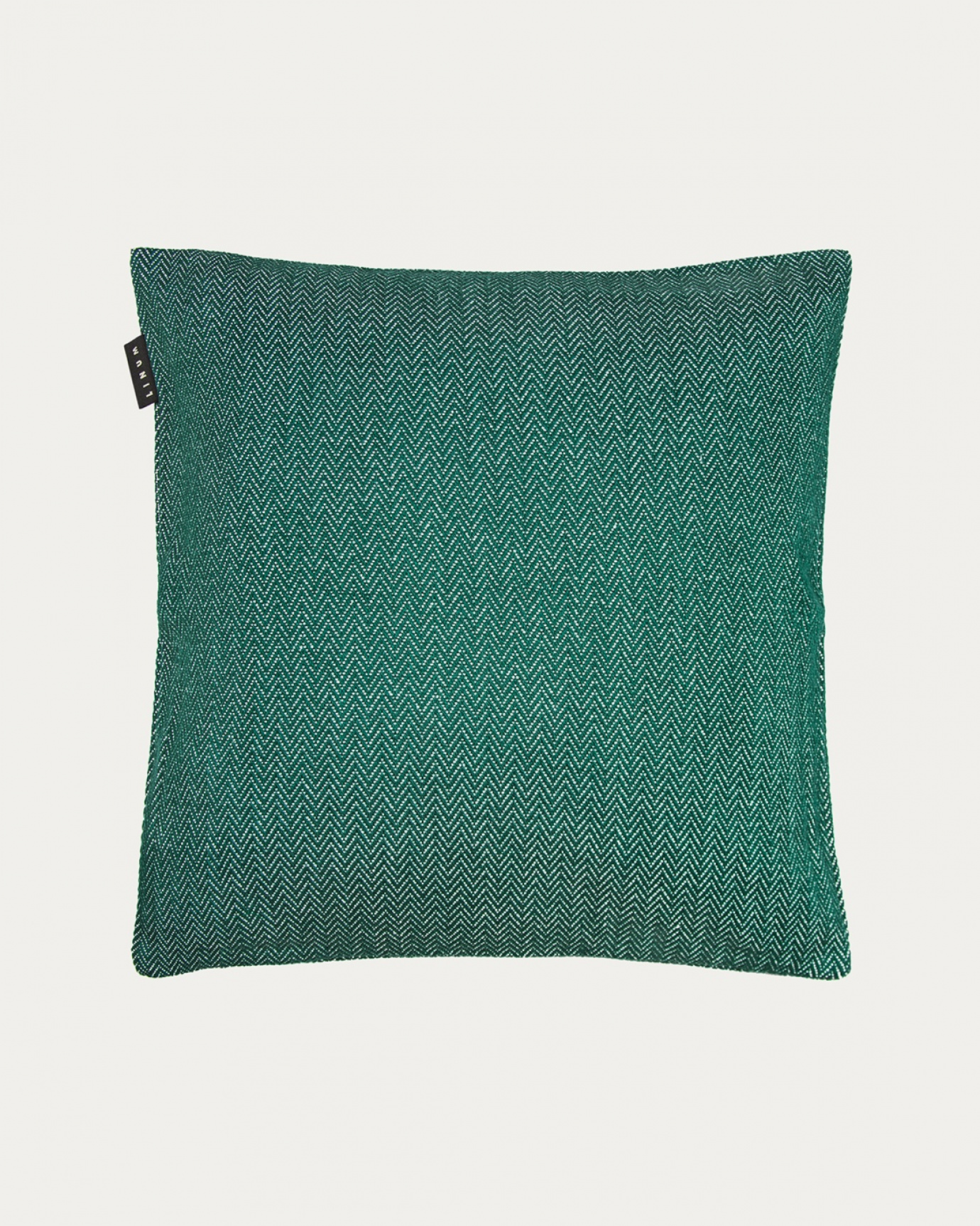 Produktbild tief smaragdgrün SHEPARD Kissenhülle aus weicher Baumwolle mit dezentem Fischgrätmuster von LINUM DESIGN. Größe 50x50 cm.