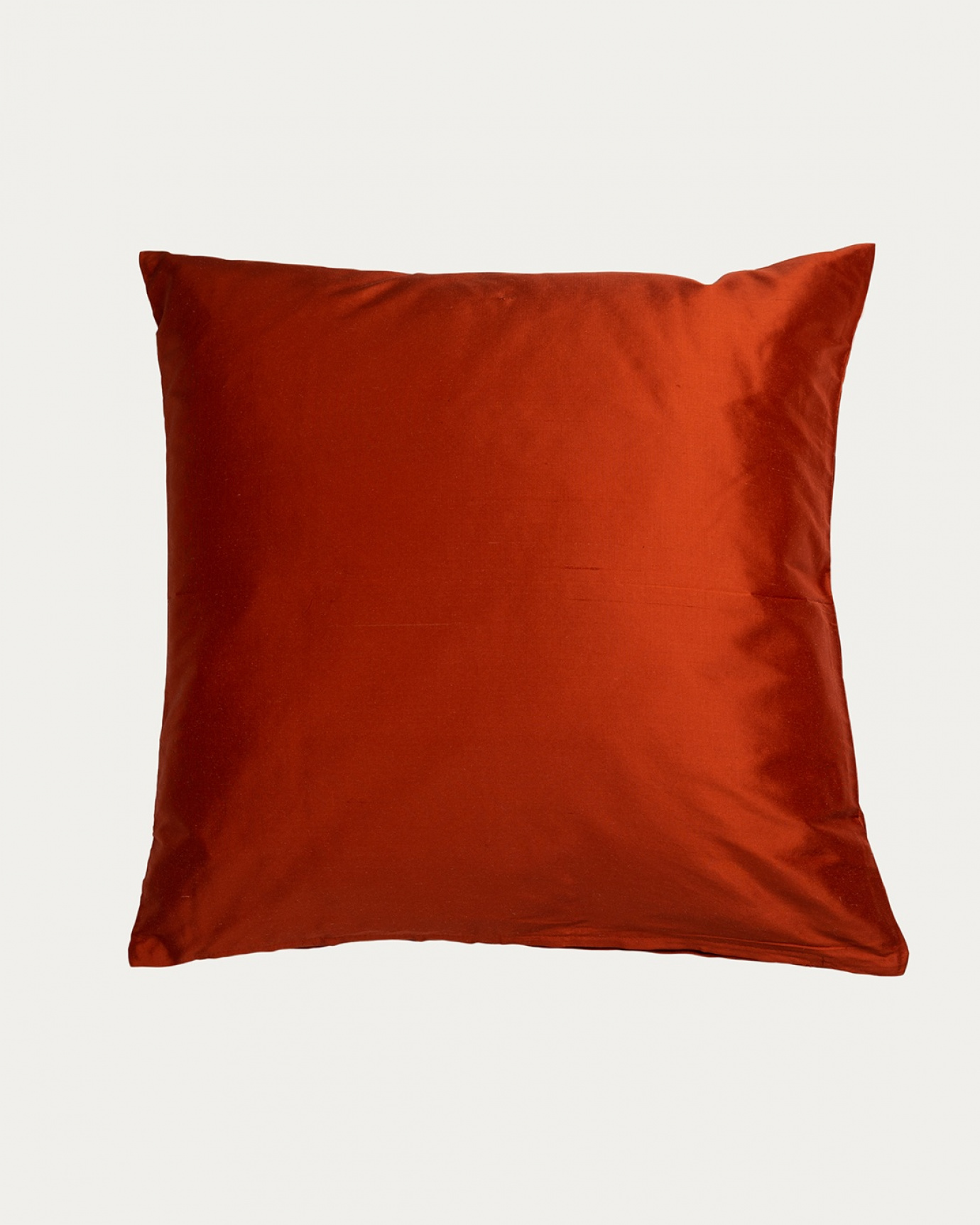 Product image rusty orange SILK cushion cover made of 100% dupion silk that gives a nice lustre from LINUM DESIGN. Size 50x50 cm.