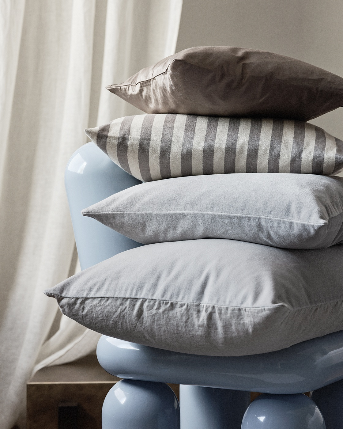 Grey shop silk cushions